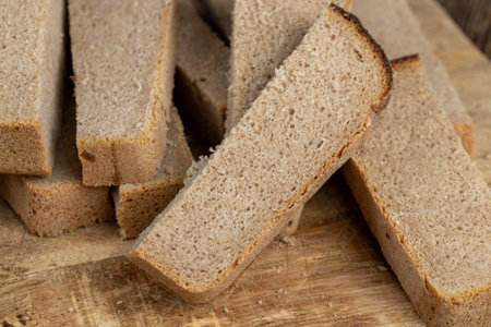 black rye loaf of rectangular bread, fresh bread using a mixture of wheat and rye flour