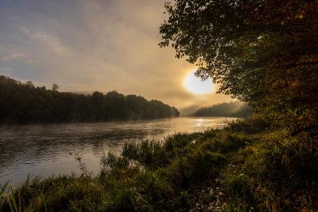 Foggy morning on the river, sunrise dispels a little fog in the lowlandsの写真素材
