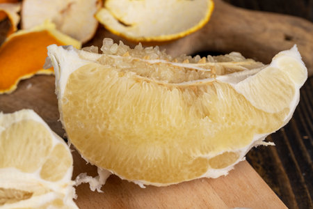 sliced peeled large pomelo, sweet pomelo close-up without peelの写真素材