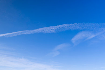 cirrus clouds in the blue sky, beautiful long cirrus clouds in the skyの写真素材