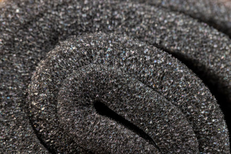 soft foam of black color for safe packaging of objects and products, foamy soft foam for giving elasticity to objects or sound insulation or as a packaging materialの写真素材