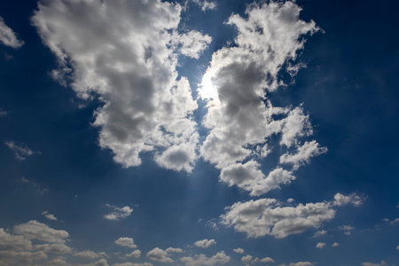 beautiful blue sky with lush white clouds in sunny bright weather, natural blue sky with cumulus...
