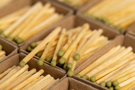 matchboxes with matches closeup, open matchboxes with new matches made of natural wood, side viewの写真素材