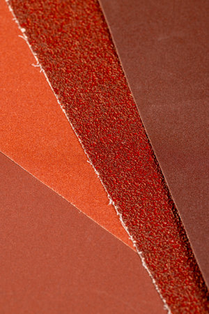sandpaper of different types and different colors, new sandpaper for processing and polishing woodの写真素材