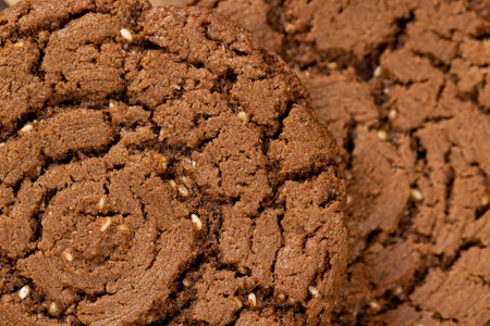 sweet biscuits on the kitchen table close up, chocolate biscuits with real cocoa and sesame