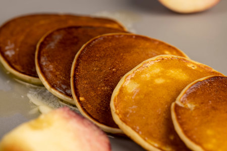 melting butter on baked pancakes, pancakes made from milk with flour on which butter melts, close up