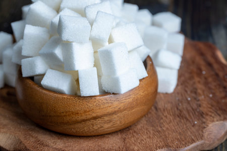 Refined white beet sugar, cubes of white sweet sugar from sugar beetの写真素材