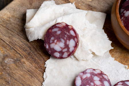 Sliced pork sausage with bacon, sliced sausage with pork fatの写真素材