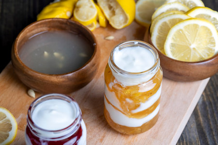 Yogurt made from fresh milk with the addition of sweet lemon jam and fresh lemons , delicious yogurt with lemon flavorの写真素材