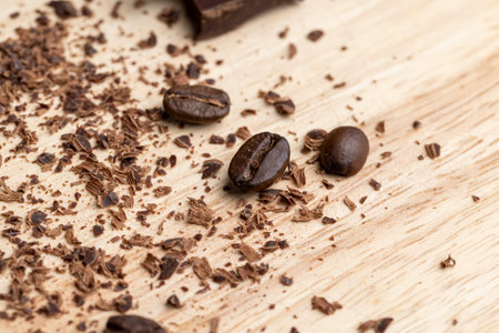 coffee grain on the table with chocolate chips, fragrant roasted coffee on the boardの写真素材