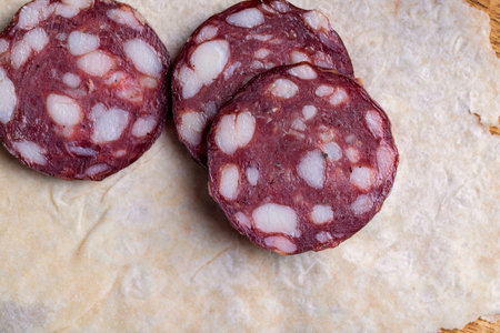 Sliced pork sausage with bacon, sliced sausage with pork fatの写真素材