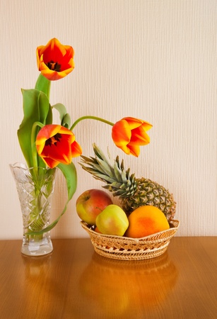 red tulips and fruitsの写真素材