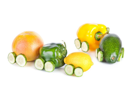 Train made of various fruit and vegetables isolated on white background の写真素材