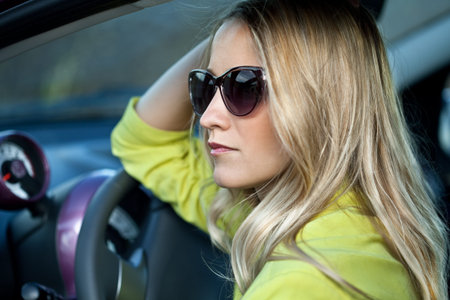 Pretty girl in a car