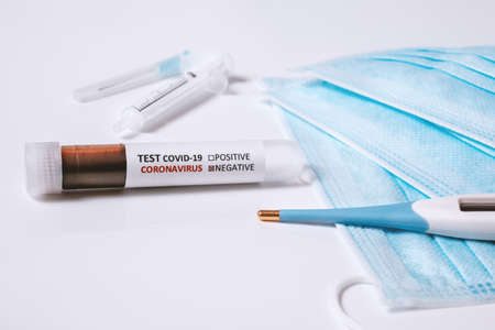 COVID-19 test. Nurse holding in hand test tube with laboratory sample of blood for 2019-nCoV Corona virus testing diagnosis analyzing, Conceptの写真素材