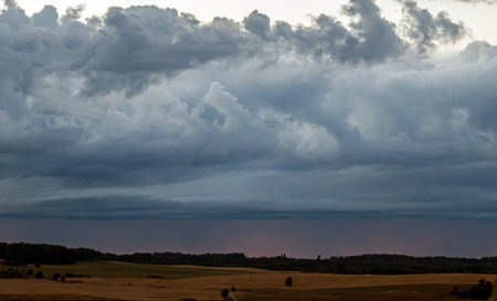 Dramatic sky over the fields. Agricultural landscape in eastern Lithuania.