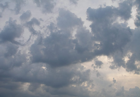 The blue sky background with tiny clouds