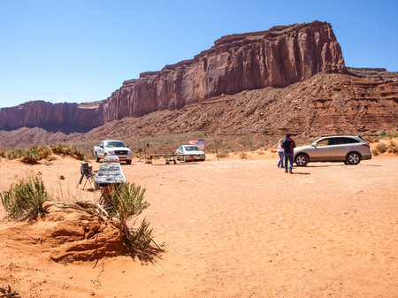 Monument Valley, Arizona, USA - May 12, 2013: Cars on the background Monument Valley.のeditorial素材