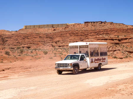 Monument Valley, Arizona, USA - May 12, 2013: Cars on the background Monument Valley.のeditorial素材
