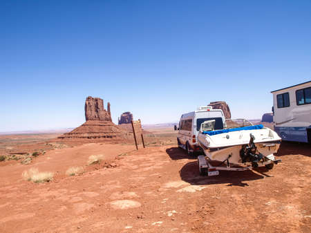 Monument Valley, Arizona, USA - May 12, 2013: Cars on the background Monument Valley.のeditorial素材