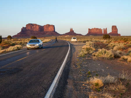 Monument Valley, Arizona, USA - May 12, 2013: Cars on the background Monument Valley.のeditorial素材