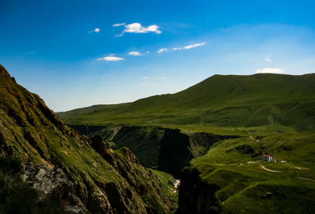 Mountain landscape with grass in the hills. Mountain landscape. Mountain vegetation.の写真素材