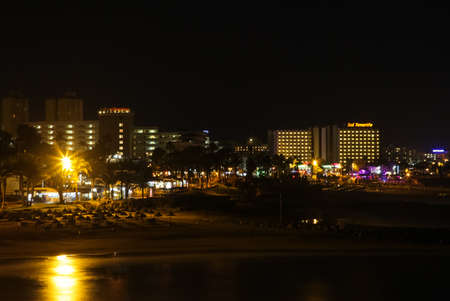 Costa Adeje, Tenerife, Spain - July 28, 2013: The islands of Tenerife is a resort for tourists. Coast of the sea and hotels on the beach.のeditorial素材