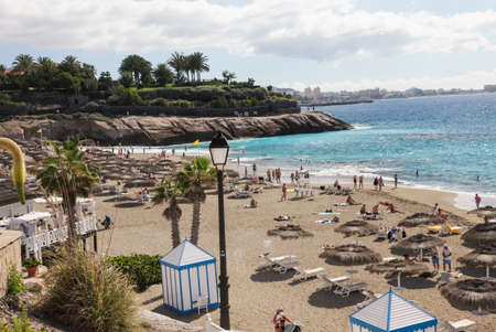 Costa Adeje, Tenerife, Spain - July 28, 2013: The islands of Tenerife is a resort for tourists. Coast of the sea and hotels on the beach.のeditorial素材
