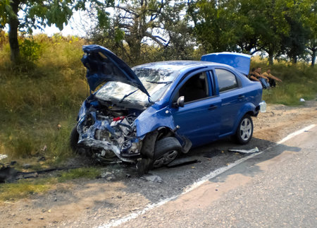 Kharkov, Ukraine - June 14, 2010: Consequences of a car accident, a wrecked car. Road traffic accidentのeditorial素材