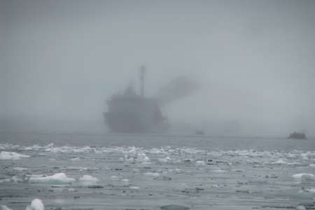 Antarctic icebergs in the waters of the ocean. Antarctic landscape Antarctic icebergs in the waters of the ocean. Antarctic landscapeの写真素材