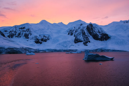 Antarctic sunsets in Antarctica. Landscape Antarctica view near the ocean.