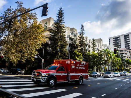 Los Angeles, USA - July 29, 2018: Fire truck rides a call down the street in Los Angeles.のeditorial素材
