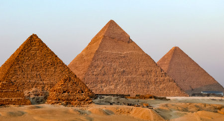 Egyptian pyramid in Giza. Architectural heritage of ancient Egyptian civilization. Ruins and statues...