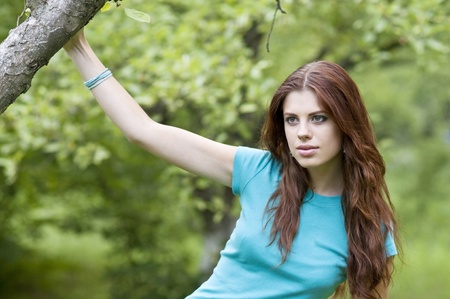 Beautiful girl and treeの写真素材