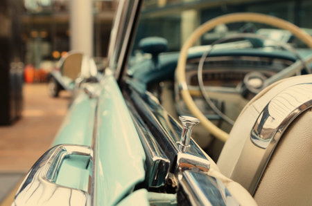 Interesting beautiful design of retro car with original wheel driving, the sensors  and door handles.のeditorial素材