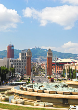 BARCELONA, SPAIN - AUGUST 11: Fountains and historic columns and the mountain of Tibidabo on August 11, 2011 in Barcelona, Spain. This place is a tourist attraction in the sitÑ.のeditorial素材