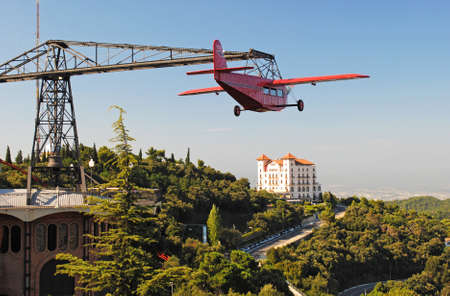 Aeroatraktsion with the plane on Mount Tibidabo in Barcelona, Spainのeditorial素材