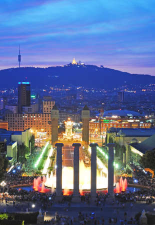 BARCELONA, SPAIN - AUGUST 11: Fountains and historic columns and the mountain of Tibidabo on August 11, 2011 in Barcelona, Spain. This place is a tourist attraction in the sitÑ.のeditorial素材