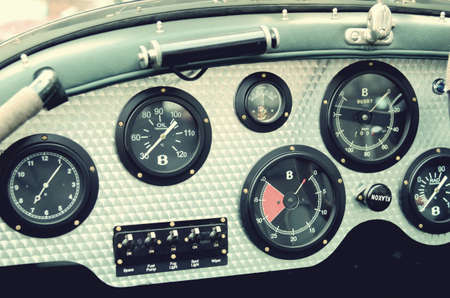 Retro car dashboard with gaugesの写真素材