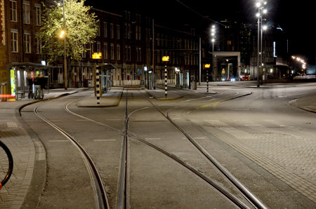 Abstract cityscape with tram tracks on the road in Amsterdam, Netherlands