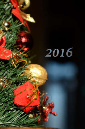 Christmas motive with gift for spruce branch (2016, New Year card - concept).の写真素材