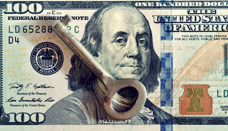 Key and dollars (corruption, lobbying, financial secrecy, loans - concept). Vintage effect.の写真素材