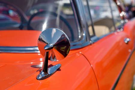 A mirror in a beautiful original old car. Retro.の写真素材