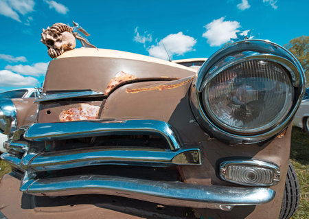 piece vintage car with a skull close up (Halloween, Satanists, goth, dark power, death - concept)