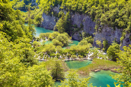 Incredibly beautiful fabulous magical landscape with a waterfall in Plitvice, Croatia (harmony meditation, antistress - concept)の写真素材