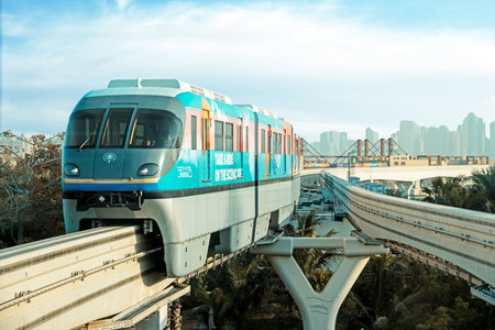 Dubai, United Arab Emirates â February 7, 2021: Monorail locomotive in Dubai on a background of skyscrapers.のeditorial素材