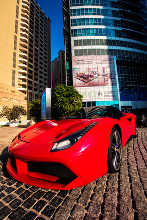 Dubai, United Arab Emirates â February 8, 2021: A red Ferrari car on a street l in Dubai.のeditorial素材