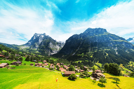 Fantastic scenery from a height on Grindelwald valley in Swiss Alps near Eiger, Switzerland, Europe.の写真素材