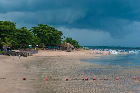 The beach in Tanjung Benoa before the rain.の写真素材