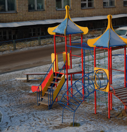Empty Playground November morning. Entertainment for children in the yard.